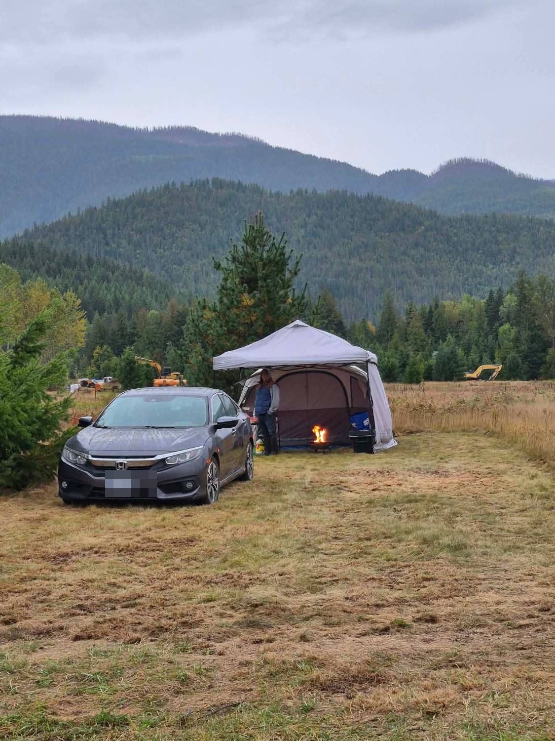 Tent camping in the meadow with mountain views at Eden Farm